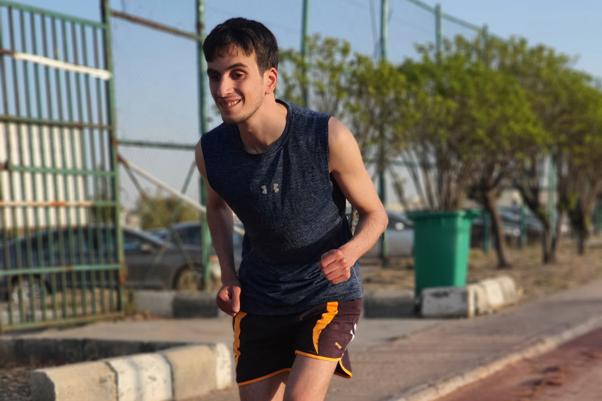 Hasan running in the Amman Marathon